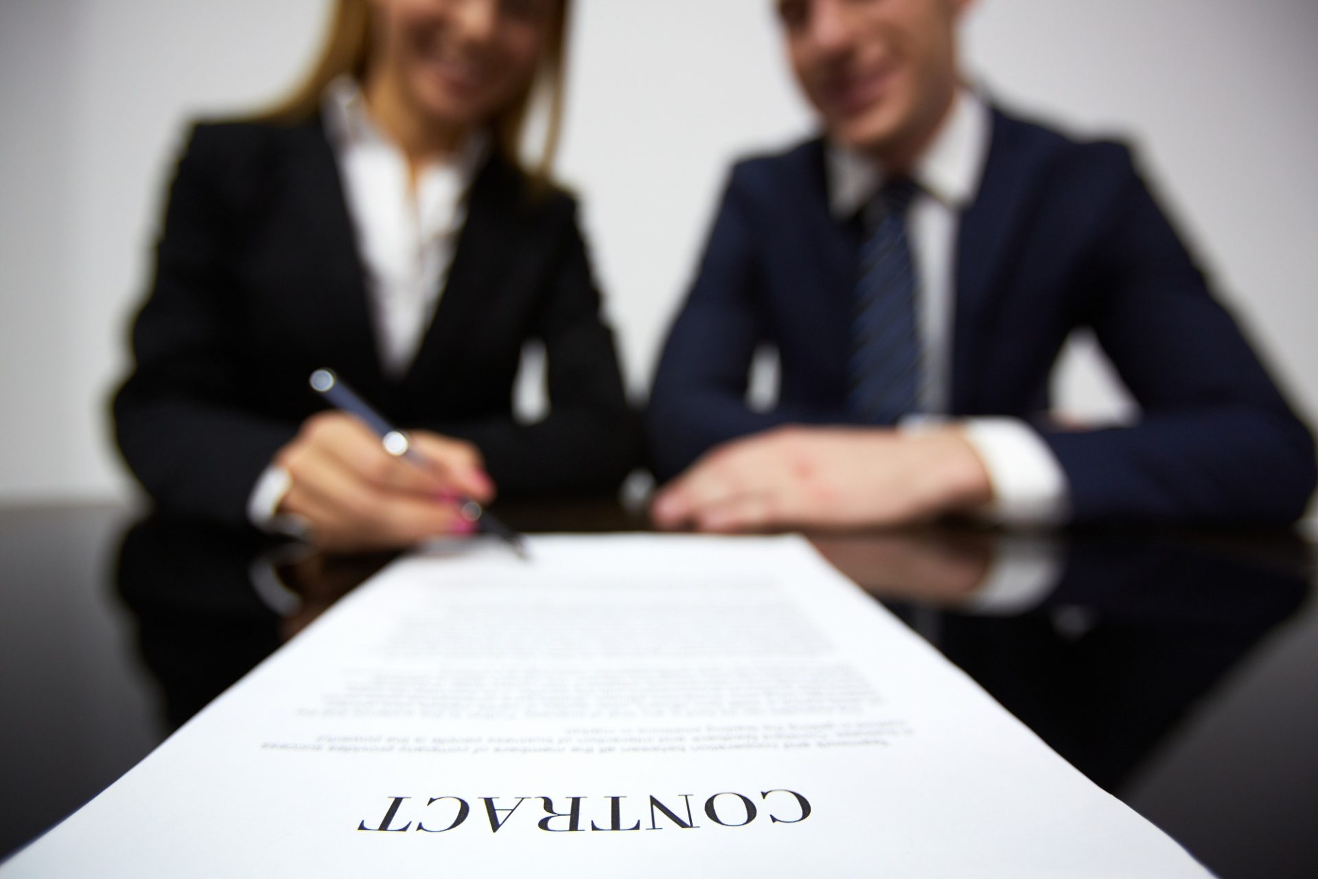 businesswoman signing new contract